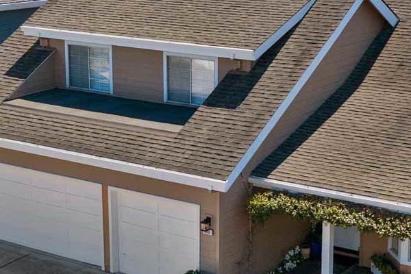 Foster City home exterior showcasing Khaki Brown HardiePlank siding and Arctic White trim