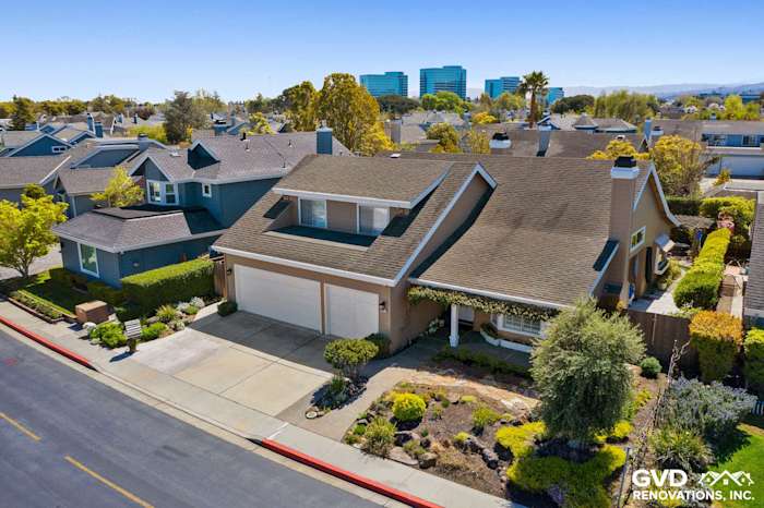 Foster City home exterior showcasing Khaki Brown HardiePlank siding and Arctic White trim