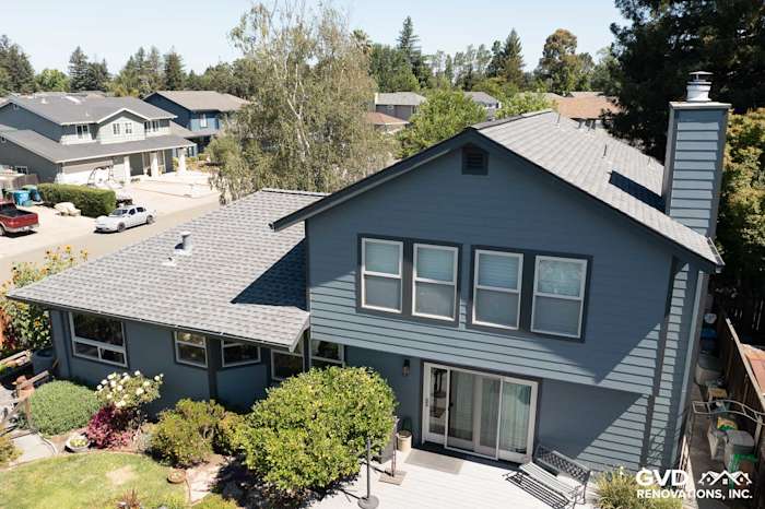 Rohnert Park home featuring Boothbay Blue James Hardie siding and Milgard windows with landscaped front yard