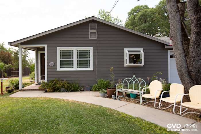 Auburn home featuring Aged Pewter HardiePlank siding and Arctic White trim with a landscaped yard