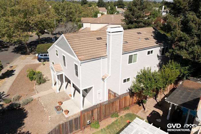 Two-story home in Petaluma with Pearl Gray James Hardie siding, Arctic White trim, and a new roof