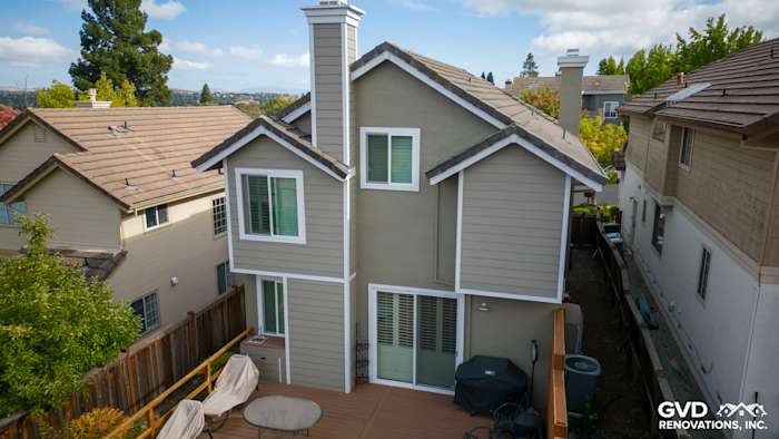 Danville home with James Hardie Monterey Taupe siding and Arctic White trim, featuring a spacious deck