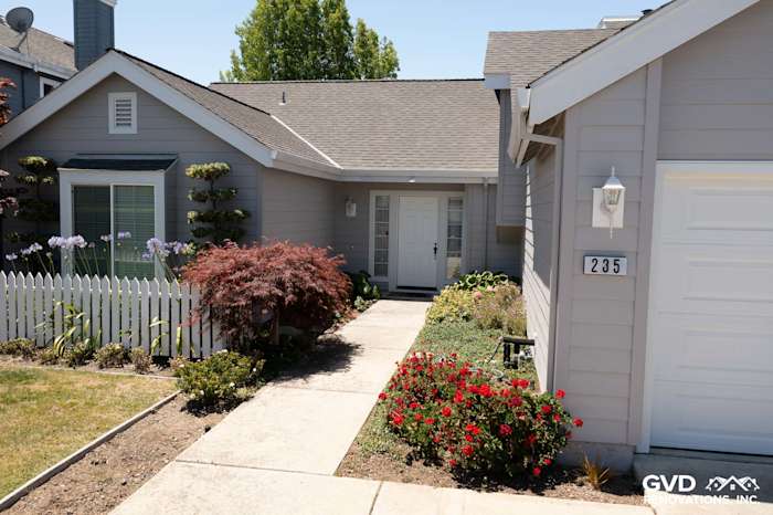 Foster City home exterior showcasing James Hardie Plank Lap Siding in Pearl Gray and Arctic White trim
