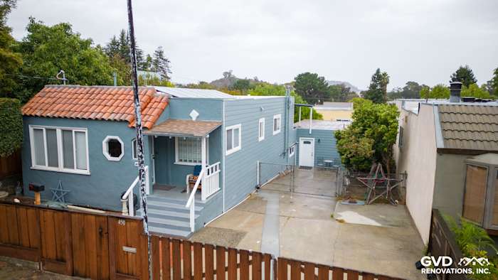 Brisbane home with Boothbay Blue HardiePlank siding and Arctic White trim, showcasing a refreshed exterior design