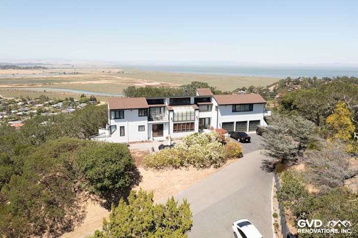 Modern home exterior with Arctic White James Hardie siding and a scenic view in San Rafael, CA