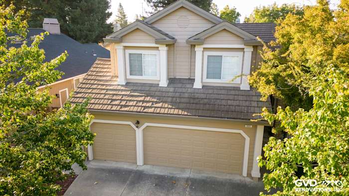 Home exterior featuring James Hardie Khaki Brown siding, Alside vinyl windows, and Cobble Stone trim in Santa Rosa