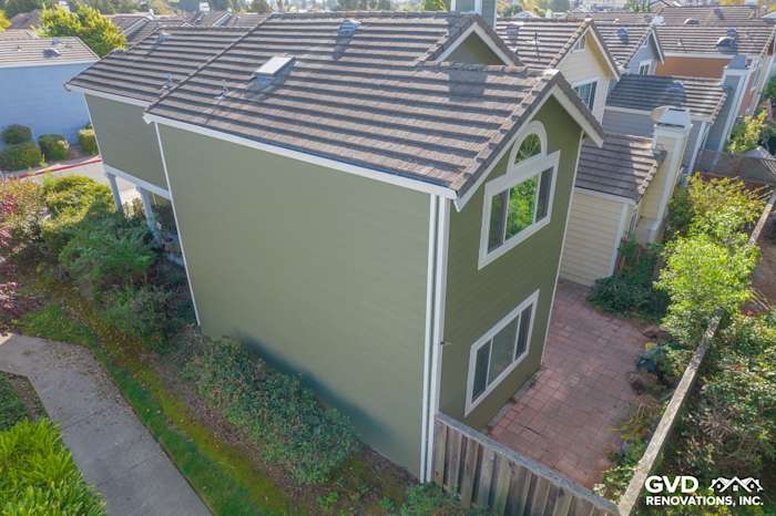 Side view of a home featuring Mountain Sage James Hardie siding and Arctic White trim in Pinole, CA