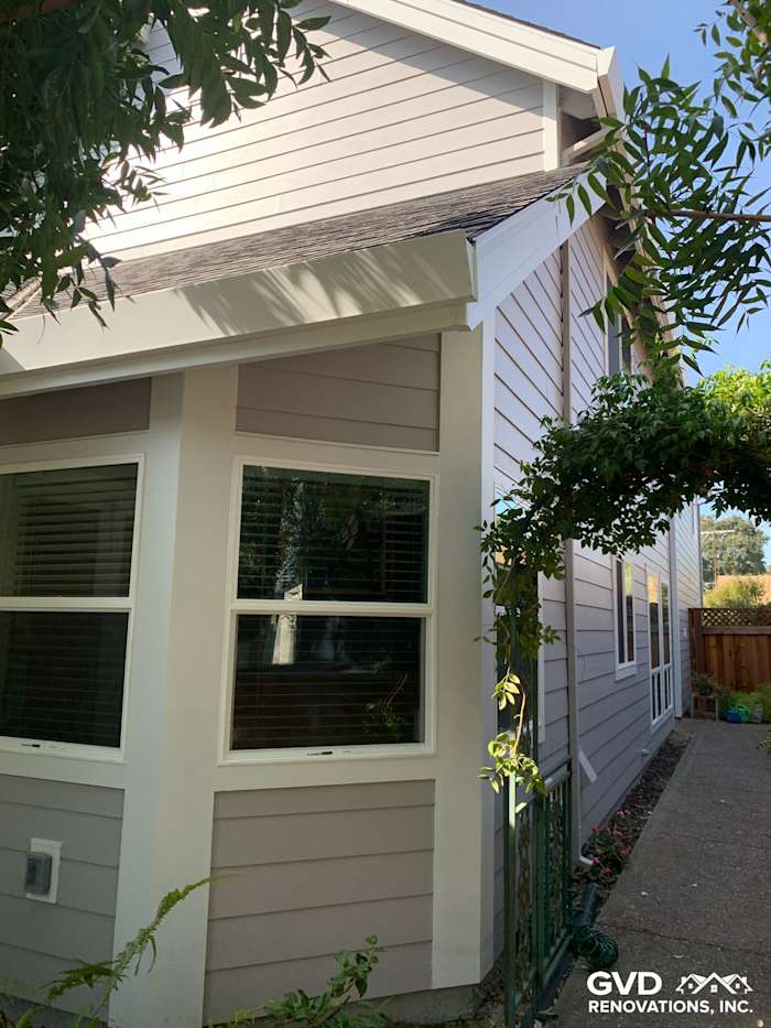 Pearl Gray James Hardie siding and Arctic White trim on a home in Napa, showcasing new windows and fresh exterior