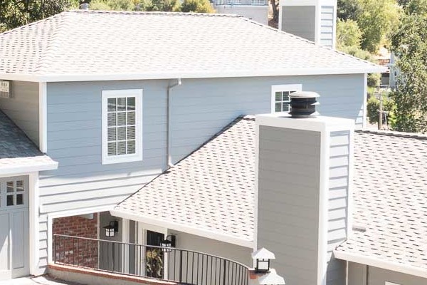 Gray Slate James Hardie Lap Siding with Arctic White trim on a renovated Orinda home exterior