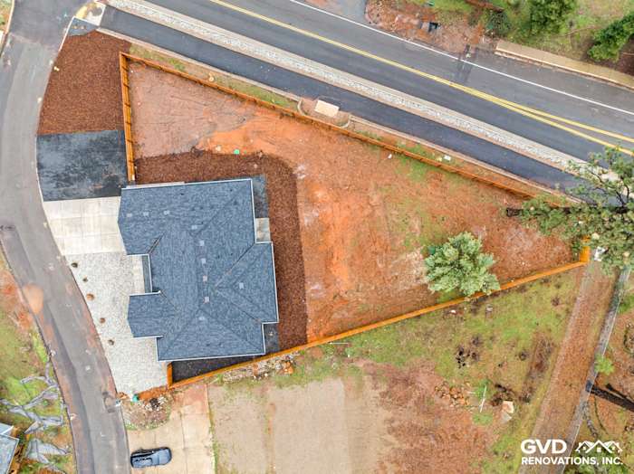 Aerial view of a new home in Paradise, CA with James Hardie siding and Milgard windows