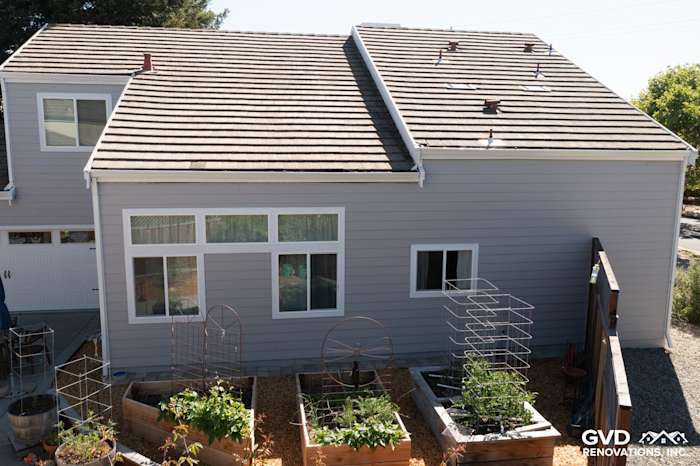 Home exterior featuring Pearl Gray James Hardie siding, Arctic White trim, and new Simonton windows in Petaluma