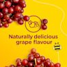 Grapes strewn across a yellow background with the text 'naturally delicious grape flavour'