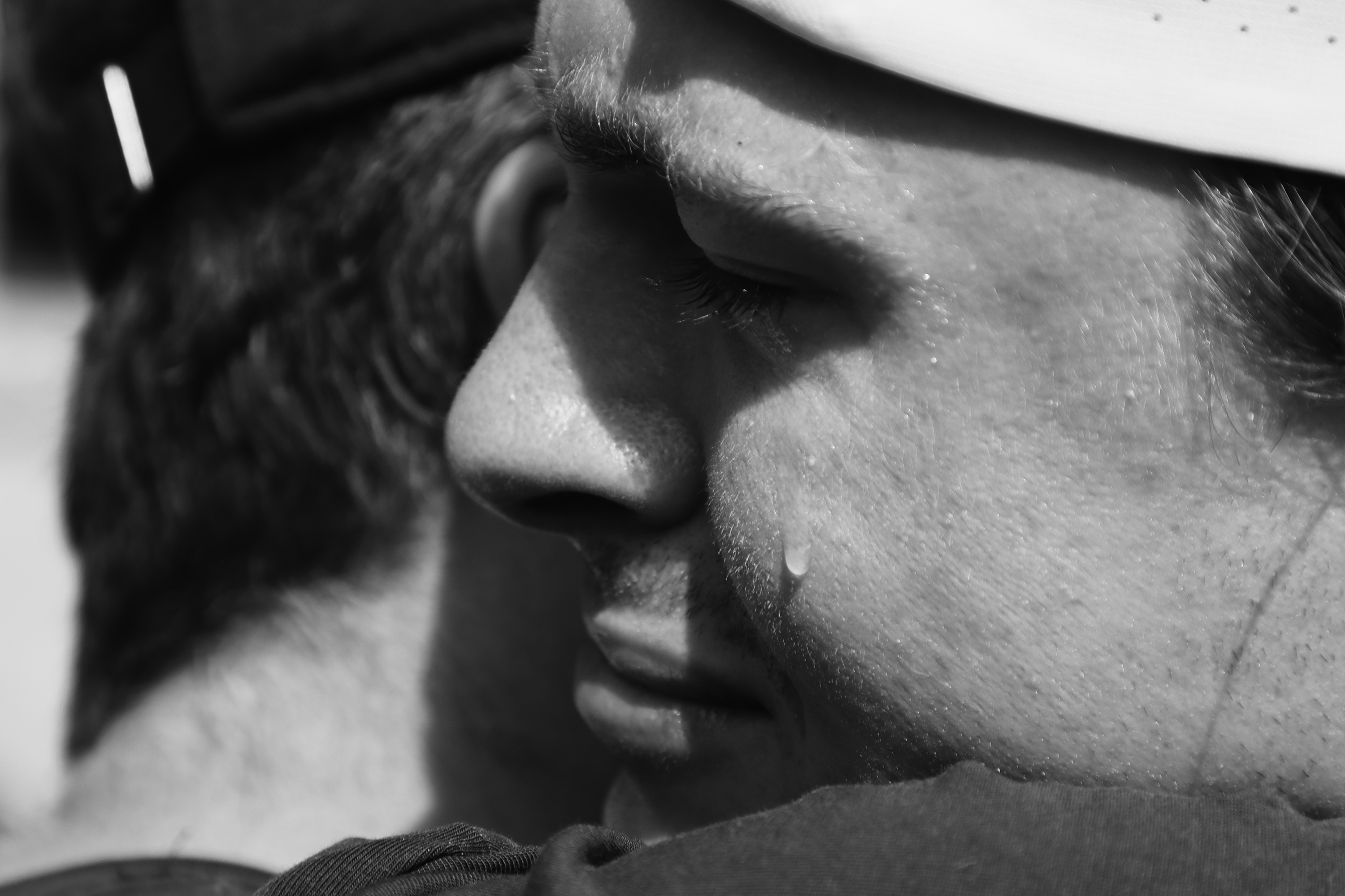 Andreas Møller Andersen sharing a moment with his father at the finish line. Photograph: Richard Miller
