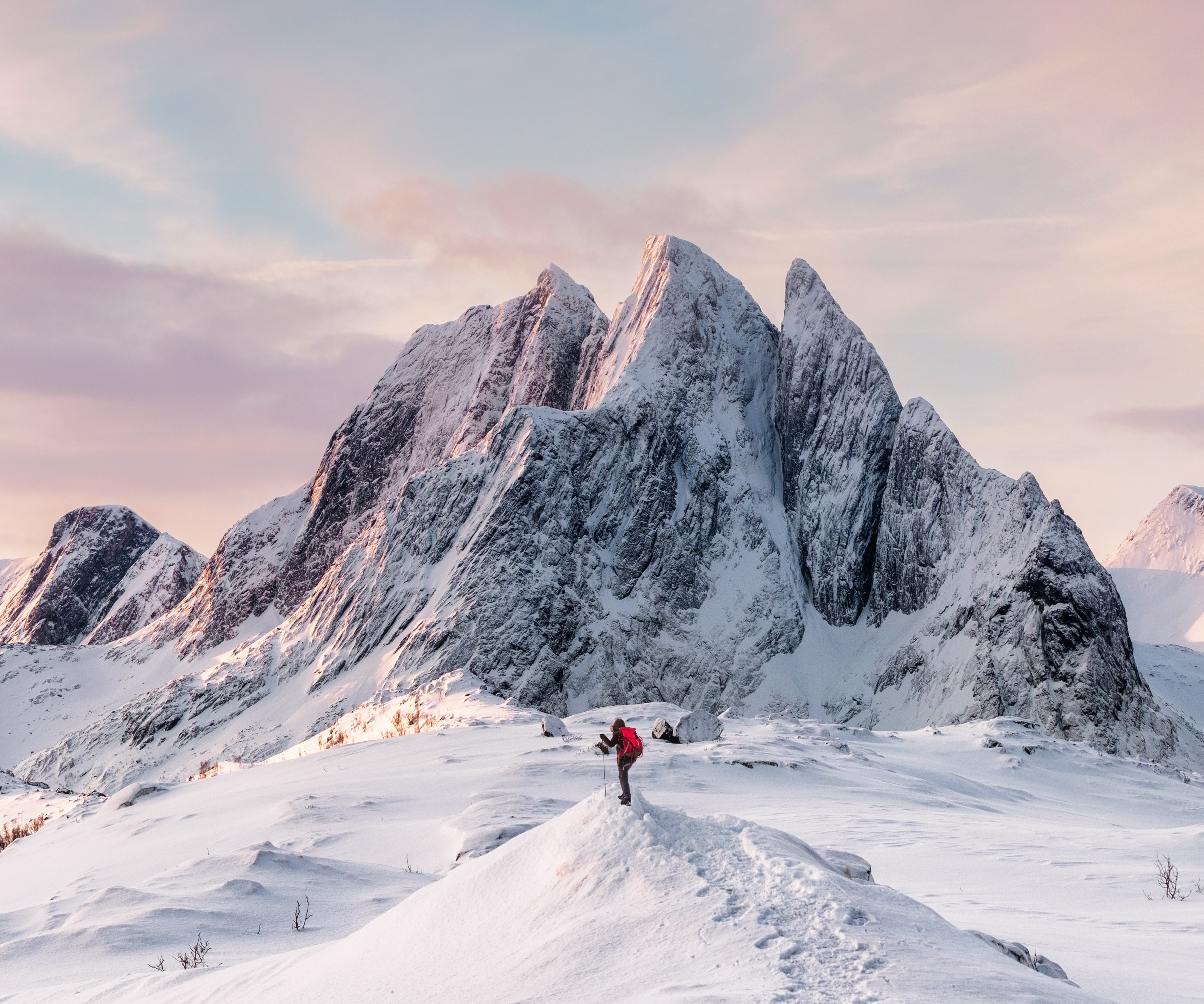 A mountaineer heading for their objective at sunrise. Photo: Mumemories, Shutterstock