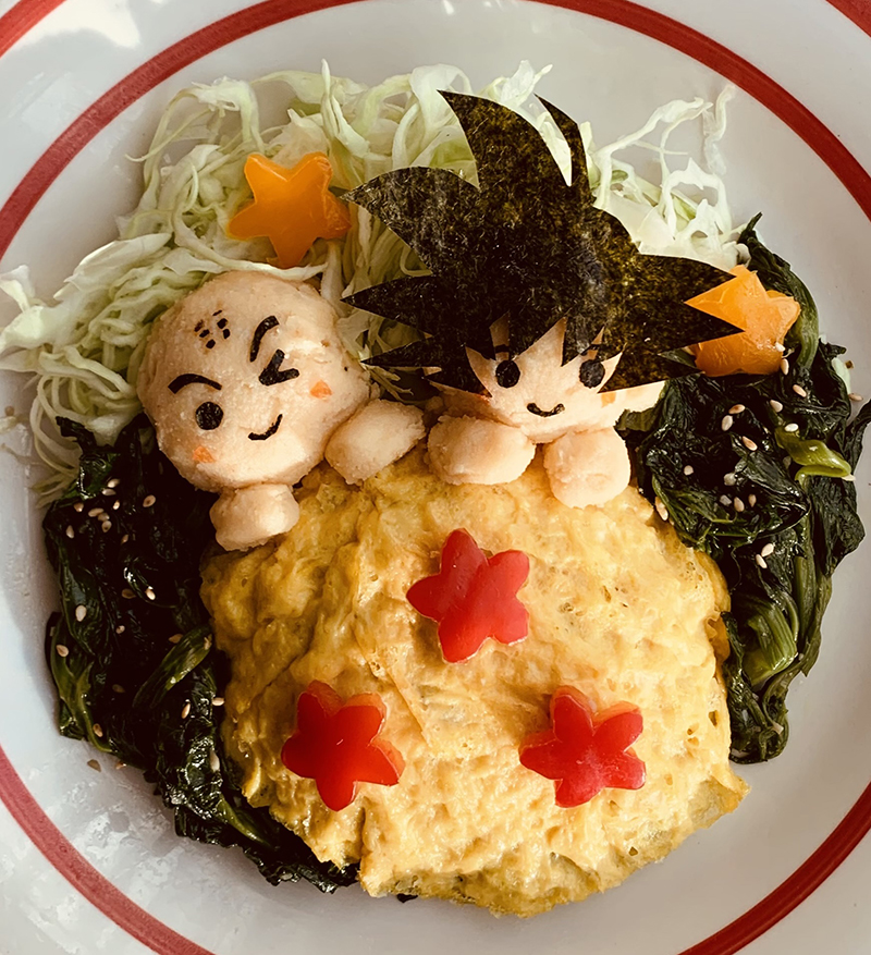 Goku and Krillin on a three-starred dragonball, made of mashed potatoes, eggs, red bell pepper, and nori.