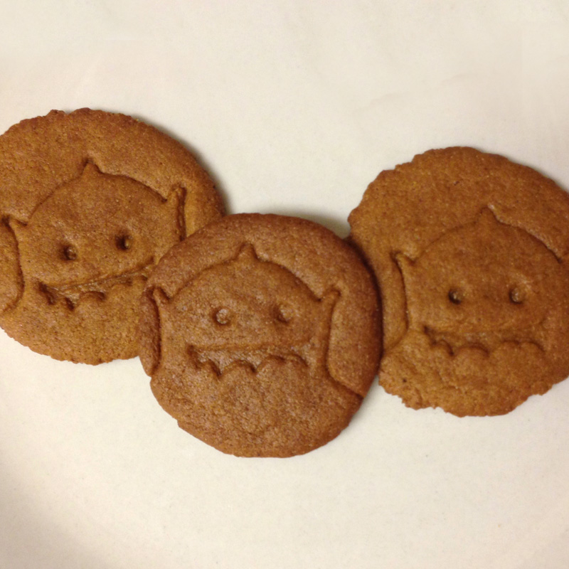 Baked ginger snaps with monster design stamped into it