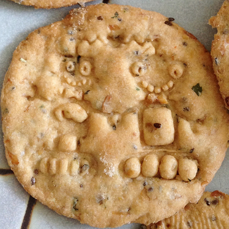 Cracker imprinted with two robots design