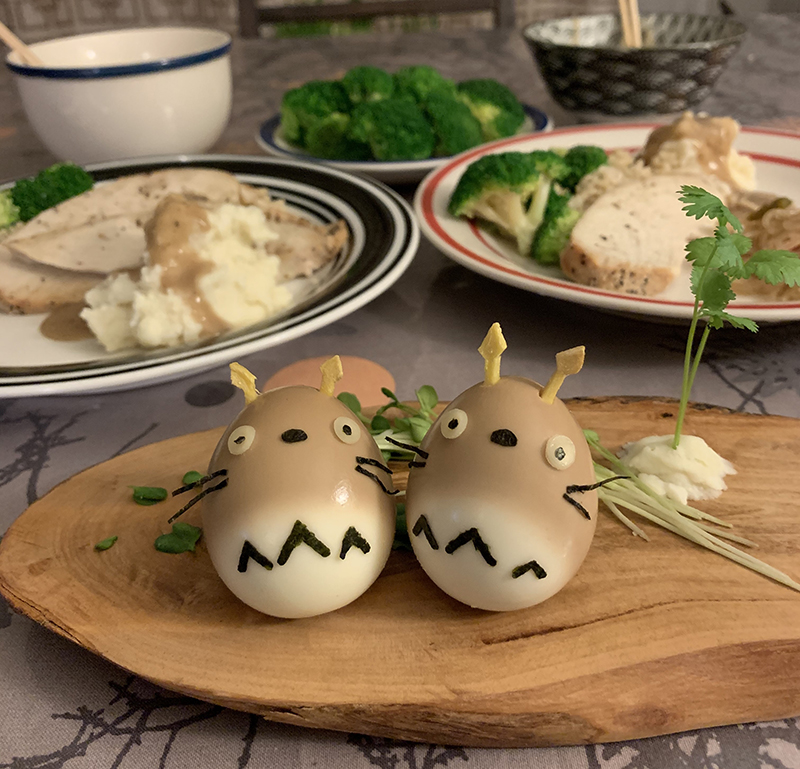 Totoros, made of soft-boiled eggs partially marinated in a soy sauce/mirin mixture, ginger, and nori.