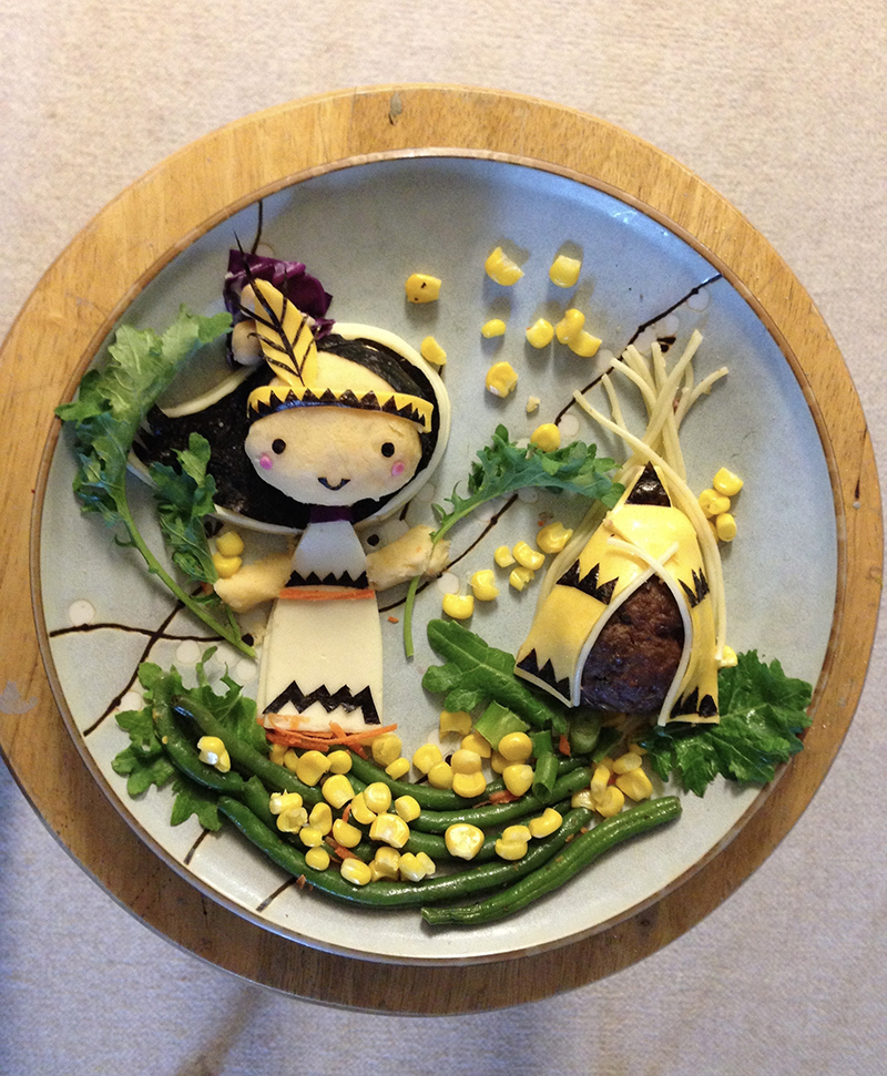 Native princess made of mashed potatoes, cheese, meatball, carrots, corn, and nori.