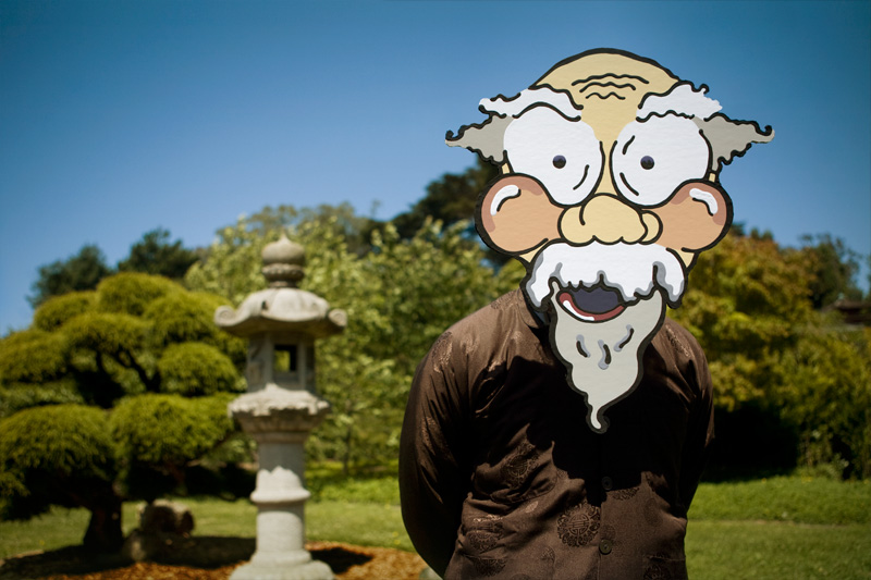 Cardboard older man at a Japanese garden