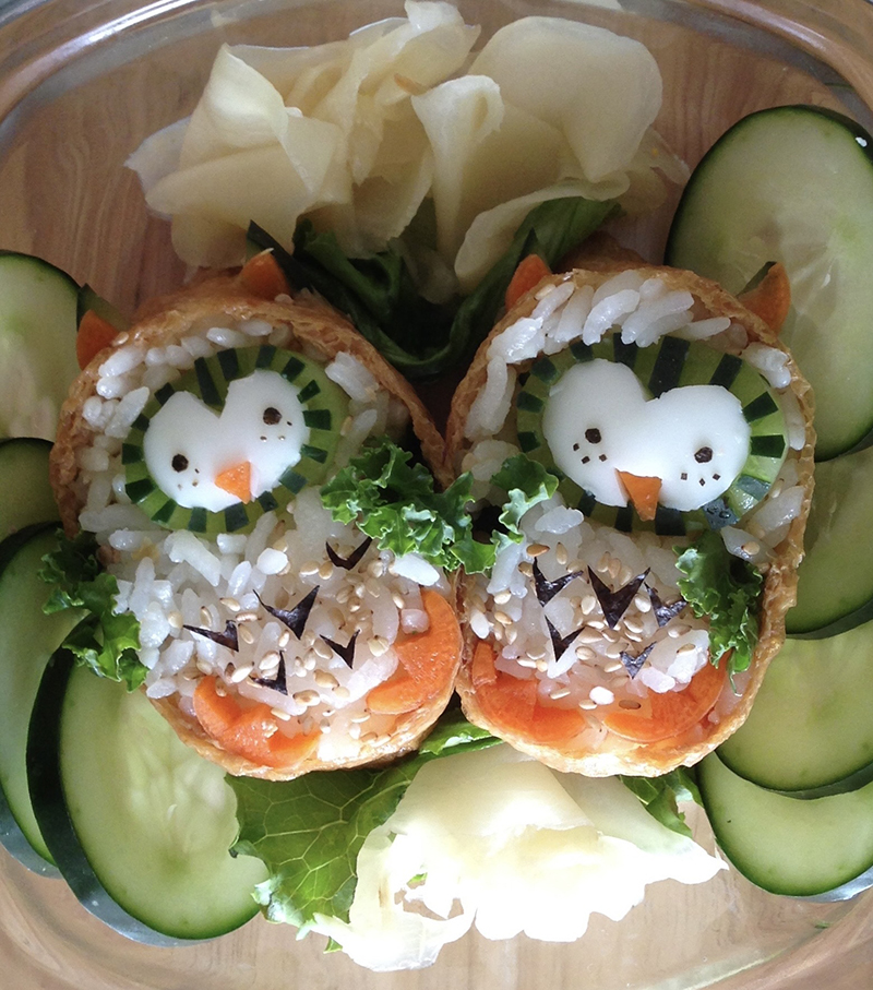 Owls made of rice, tofu wrappers, eggs, carrots, cucumbers, and nori.
