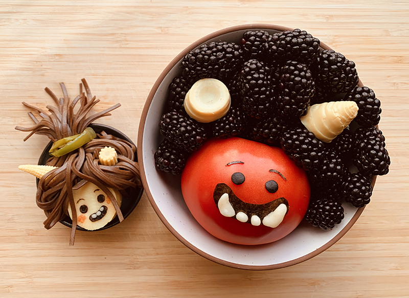 Nariodon and Onari are made with a tomato, blueberries, bamboo shoots, soba noodles, baby corn, green bell pepper, almond paste, and nori.