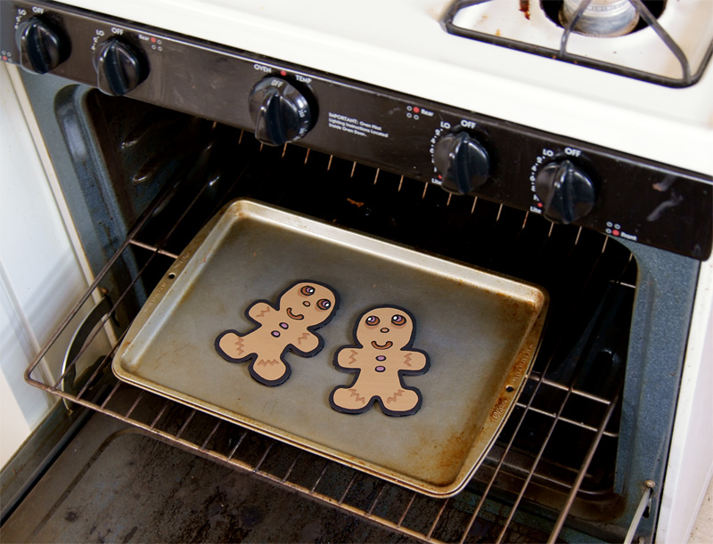 Cardboard gingerbreads going into the oven