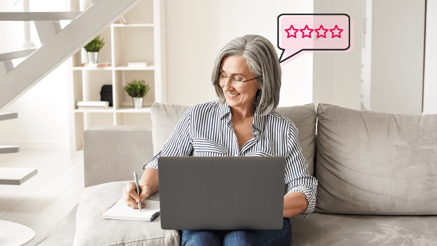 old-white-woman-on-laptop-in-living-room