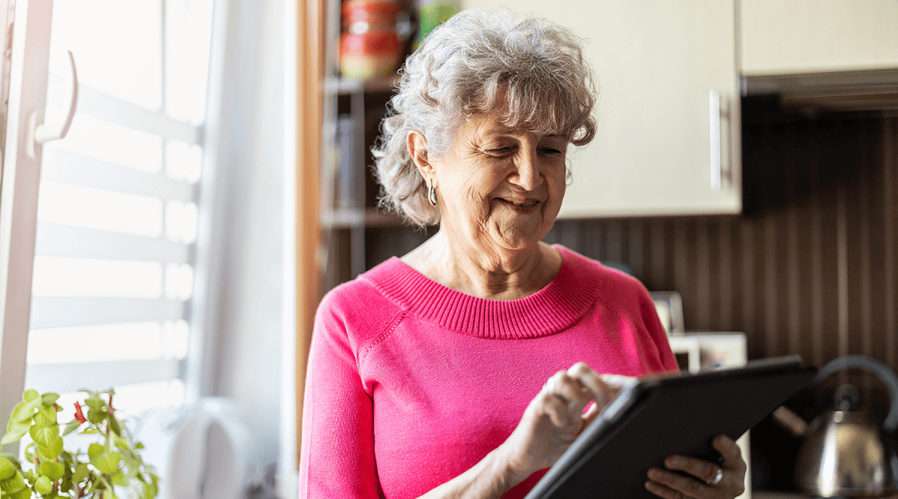old-women-smiling-on-tablet-with-provider
