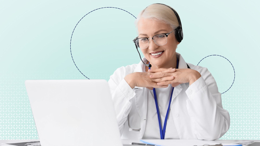 Doctor wearing headset on laptop