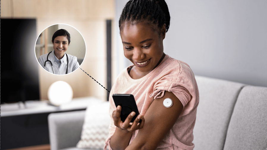 woman talking to her doctor on video call while wearing continuous glucose monitor