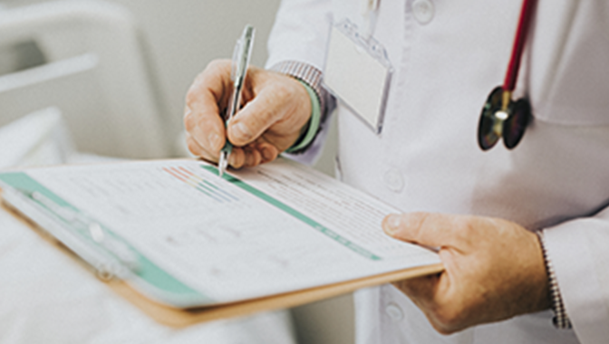 Healthcare-provider-reviewing-document 