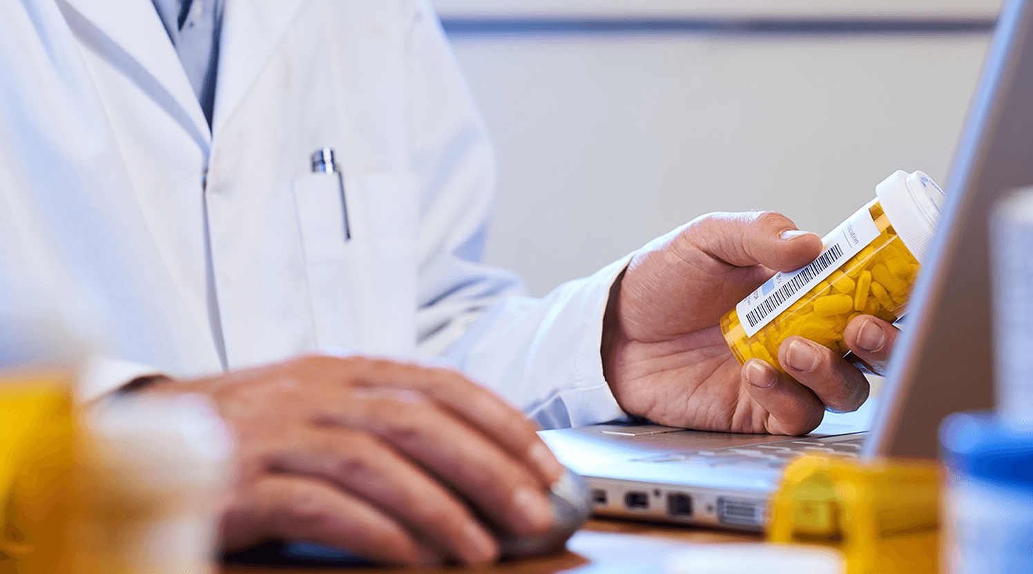 Pharmacist-verifying-prescription