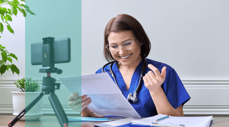 Healthcare-provider-reviewing-documents-with-patient-via-telehealth