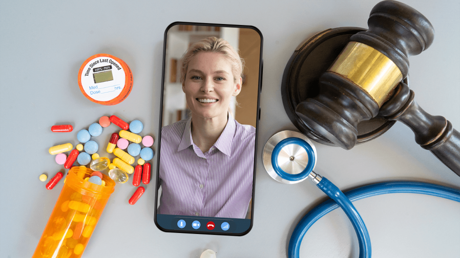phone-with-smiling-provider-and-gavel-stethoscope-on-table