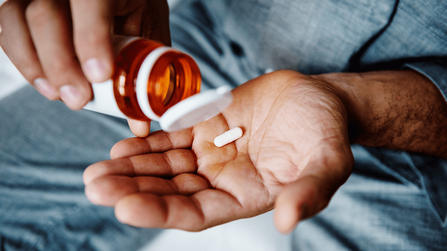 Man taking medication