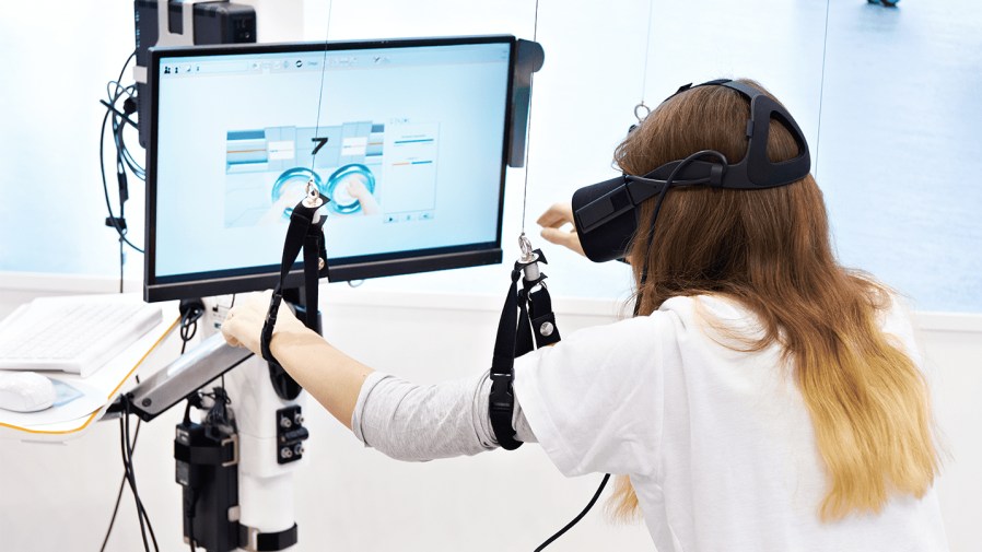woman-using-virtual-reality-technology-in-study