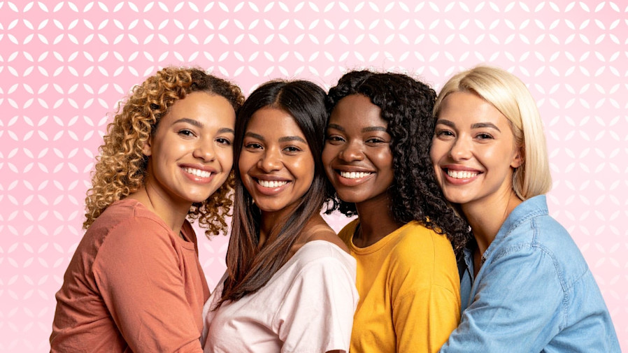 Group of multi-ethnic women hugging each other