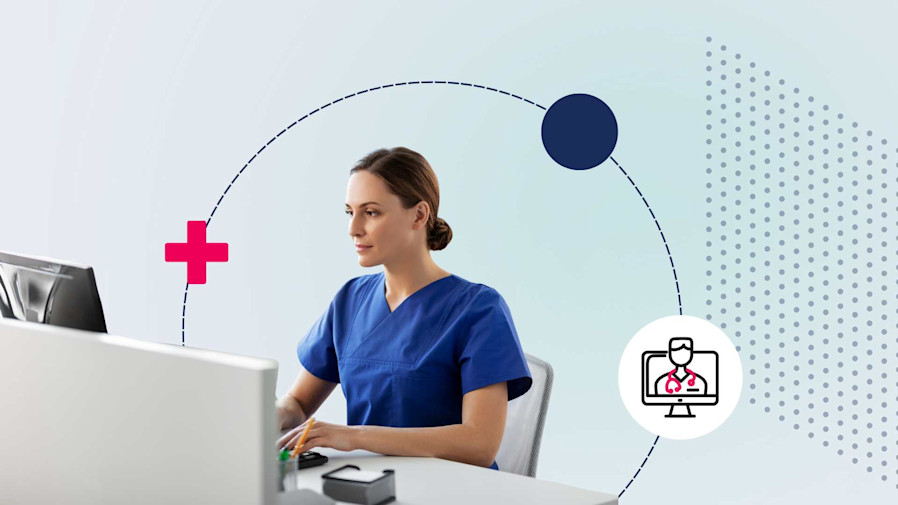 Provider sitting at her desk and charting notes on her computer