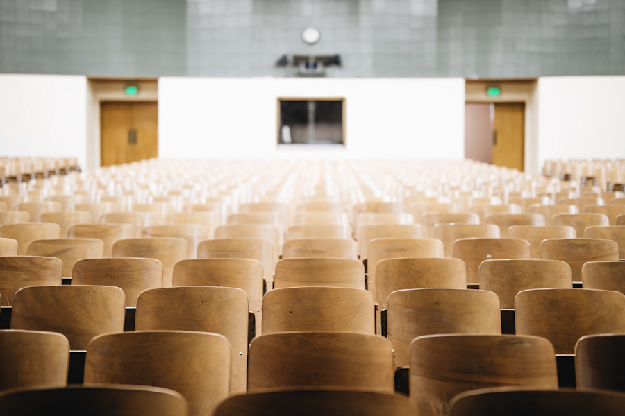 An empty university lecture hall. 