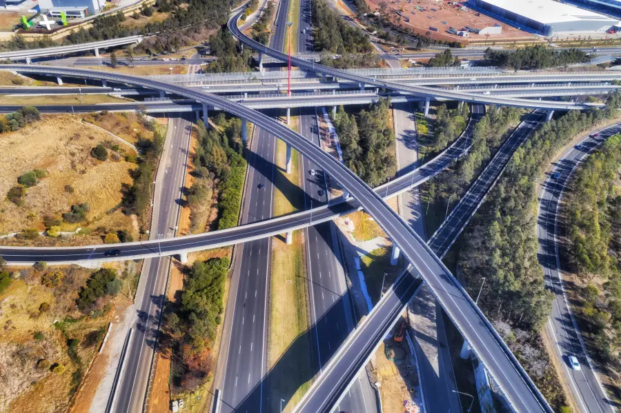 Ariel view of a freeway network with multiple freeway interchanges.