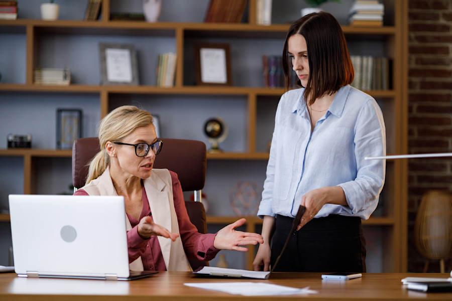 two females in workplace, potential bullying