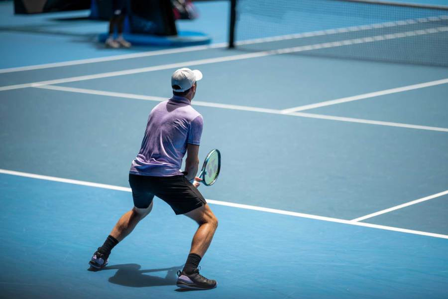 Man playing professional tennis