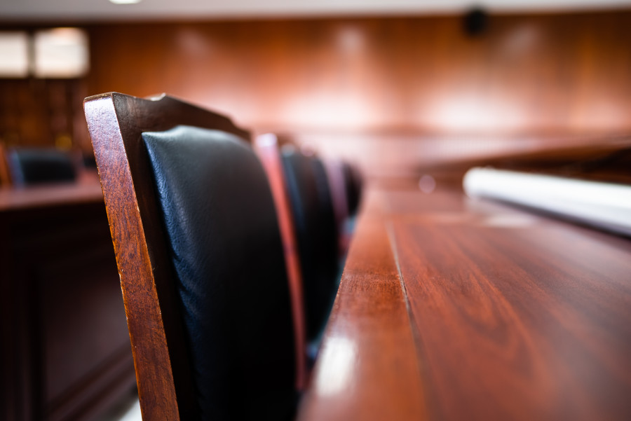 Table and chair in the courtroom of the judiciary.