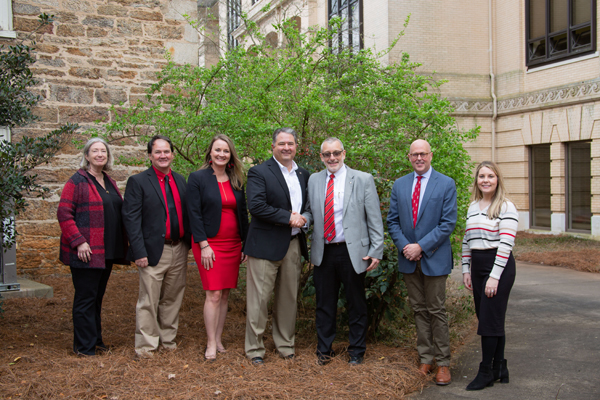 Picture of UGA’s College of Agricultural & Environmental Sciences professors celebrating the endowment of the Orkin Professorship in Urban Entomology.