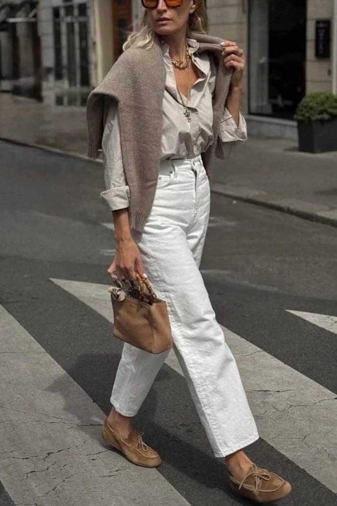 spring outfit formula: cream trench coat, wide-leg trousers and tan loafers