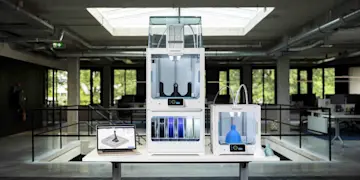 Large and small format 3D printers side by side