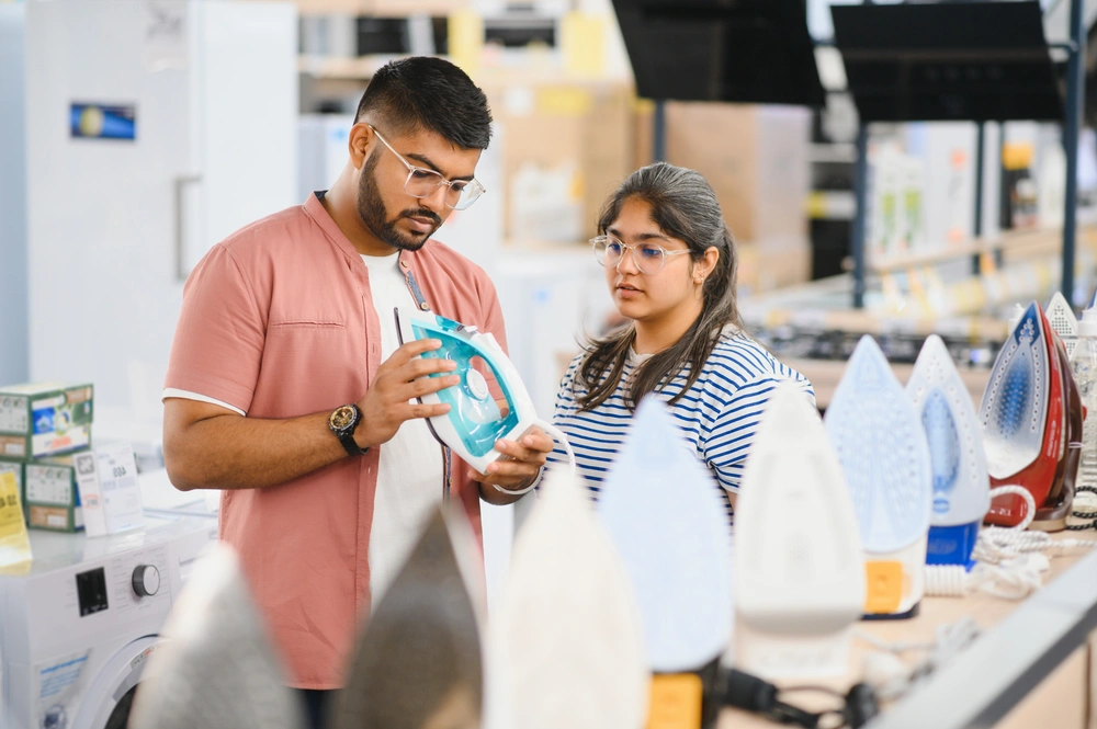 young-indian-woman-and-a-young-man-choosing-a-stea