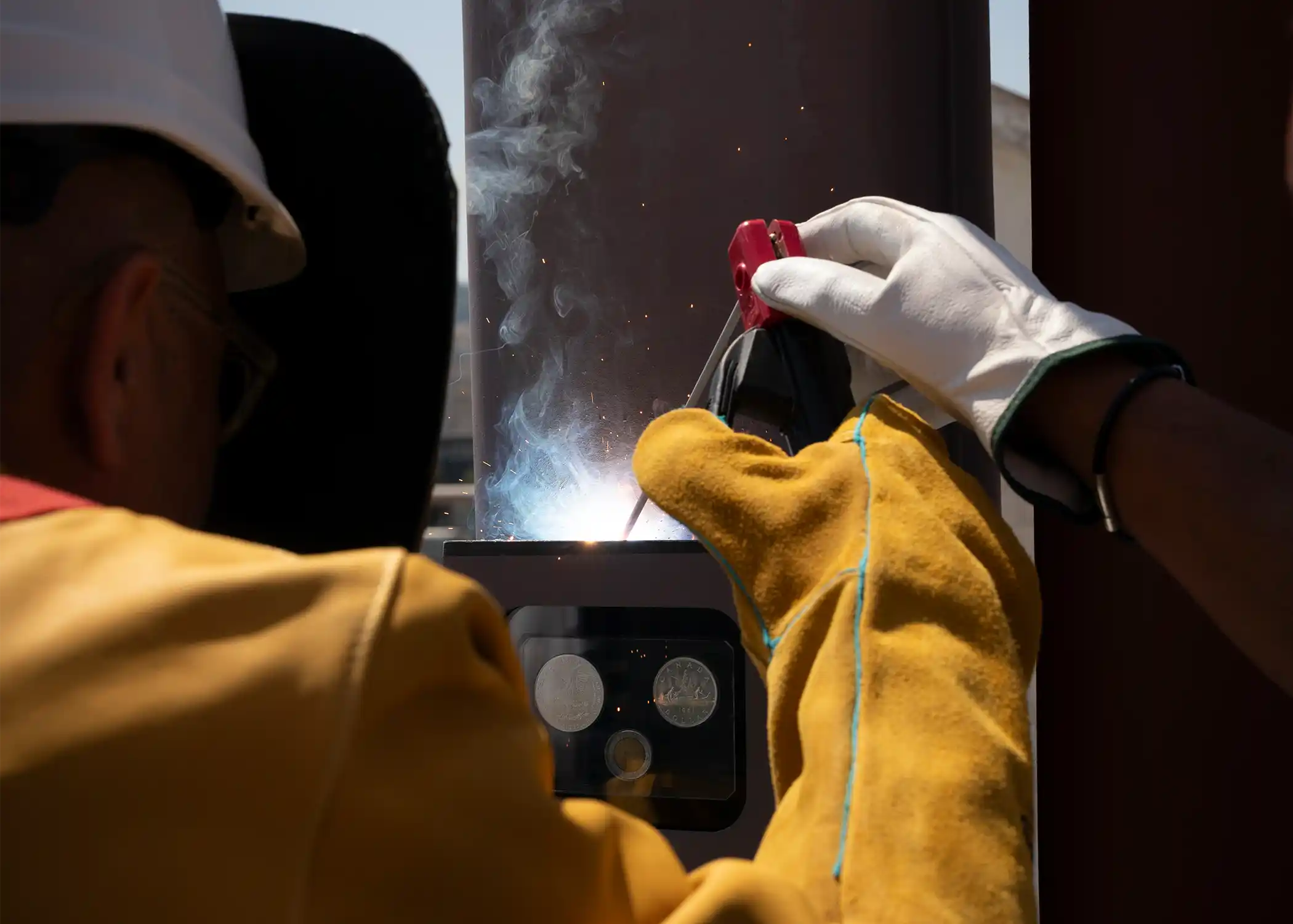 Nadim Ashi welding the coins to the keel at the Four Seasons Yachts Keel Laying ceremony. 