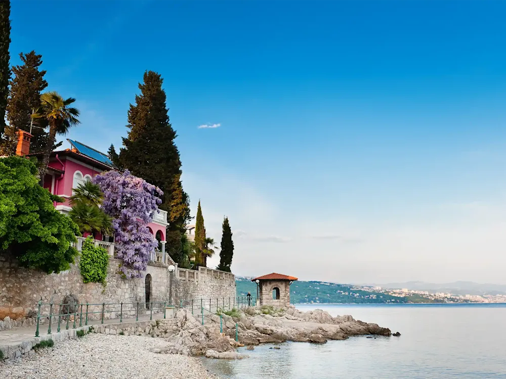 A waterside village with cypress trees on the Adriatic